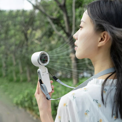 Mini Foldable Fan with Mist Spray – Portable Cooling in Your Pocket!